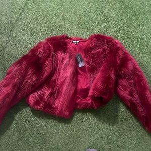 Red. Large faux fur, fashion nova with tags still attached!